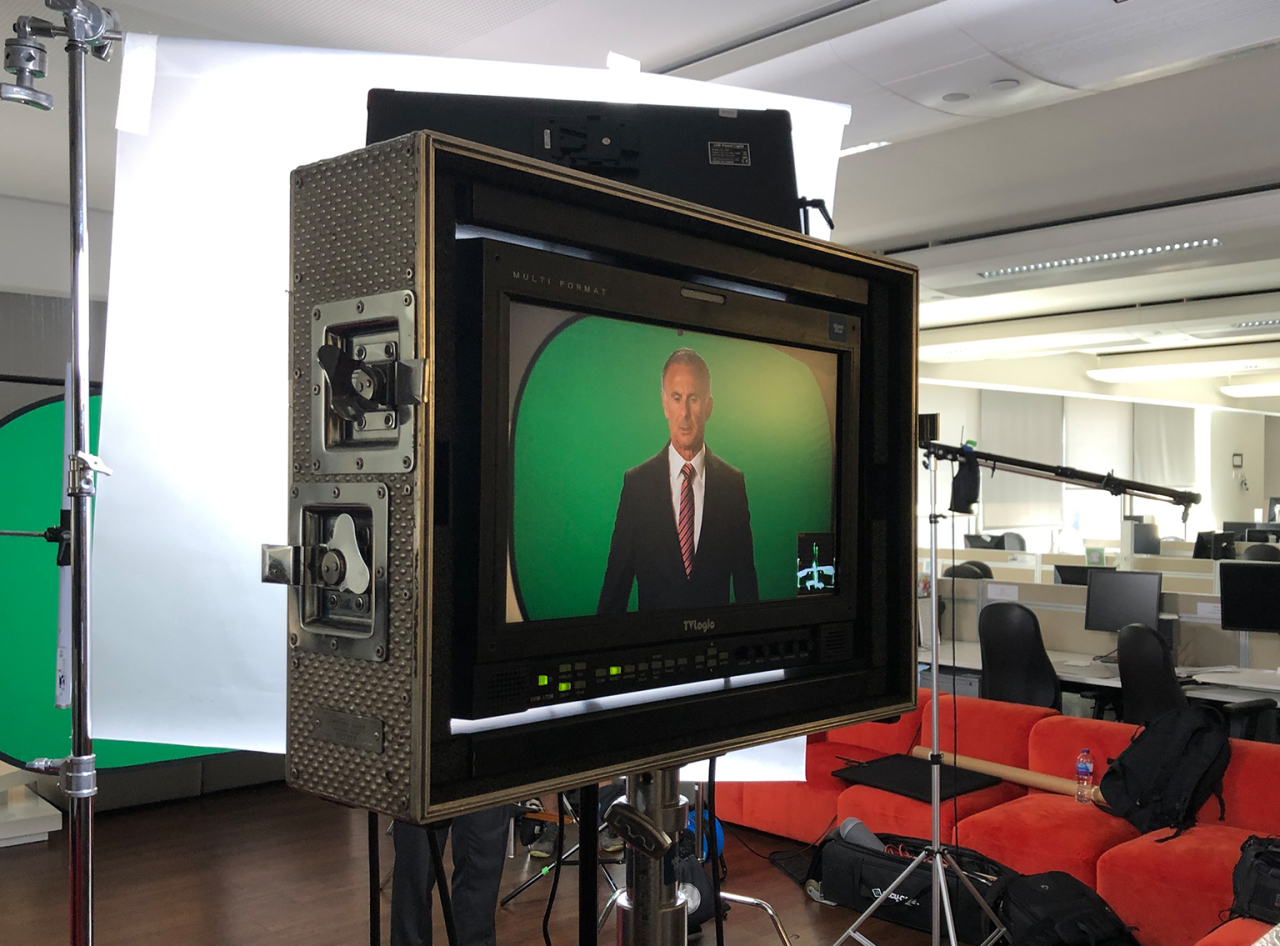 Image of monitor showing recording of TV ad.