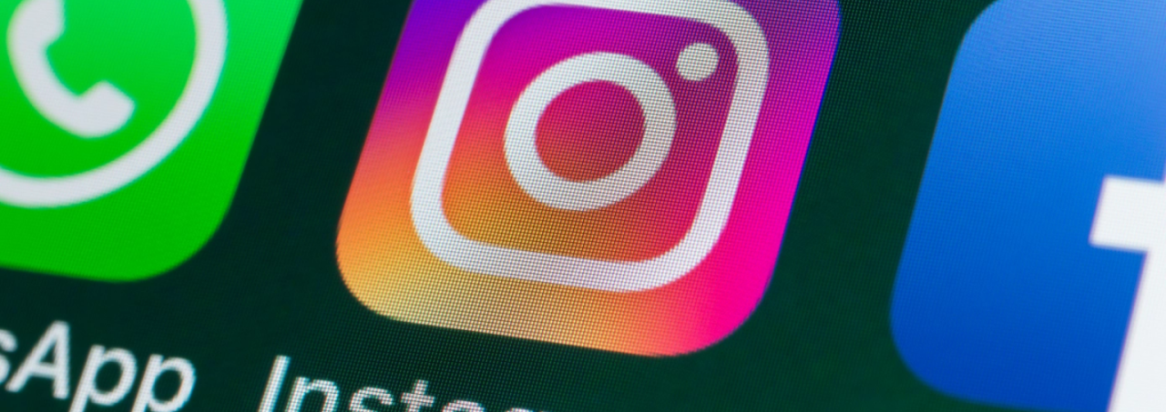 A phone screen showing: WhatsApp, Instagram and Facebook's app icon.
