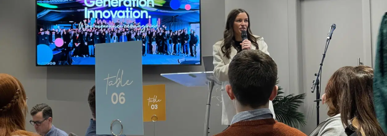 An accomplished speaker addressing participants at Generation Innovation.